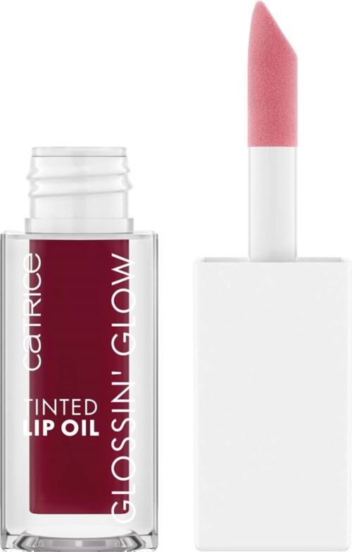 En liten flaska läppolja med rosa läppstift på toppen, märkt Glossin Glowing.