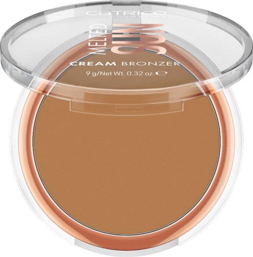 Een kleine bronzer met doorzichtig deksel, gemerkt 'Cream Bronzer', die een lichtbruine tint toont.