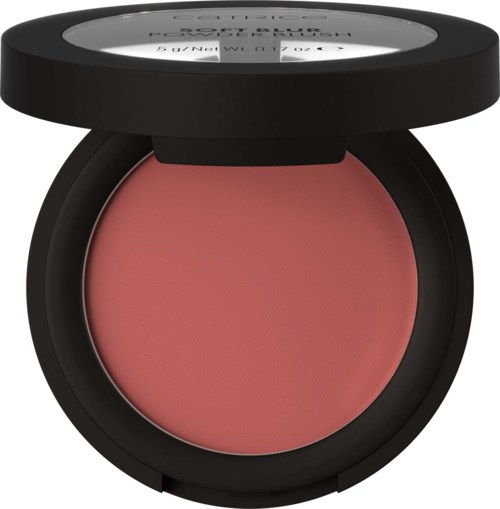 A blush makeup product in a black round compact with a slightly open lid.