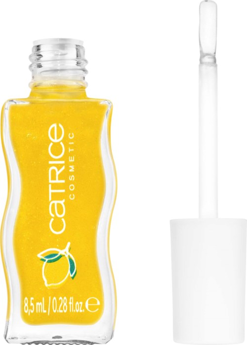 En gul vätska i en klar flaska med vit kork och borste applicator.