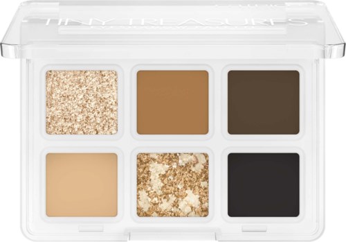 Six makeup eye shadows in different colors, some glittery, some matte, arranged in a white rectangular case.