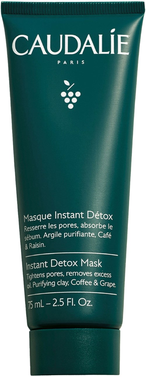 A teal tube of Caudalie Instant Detox Mask with text about pore tightening and ingredients like clay, coffee, and grape.