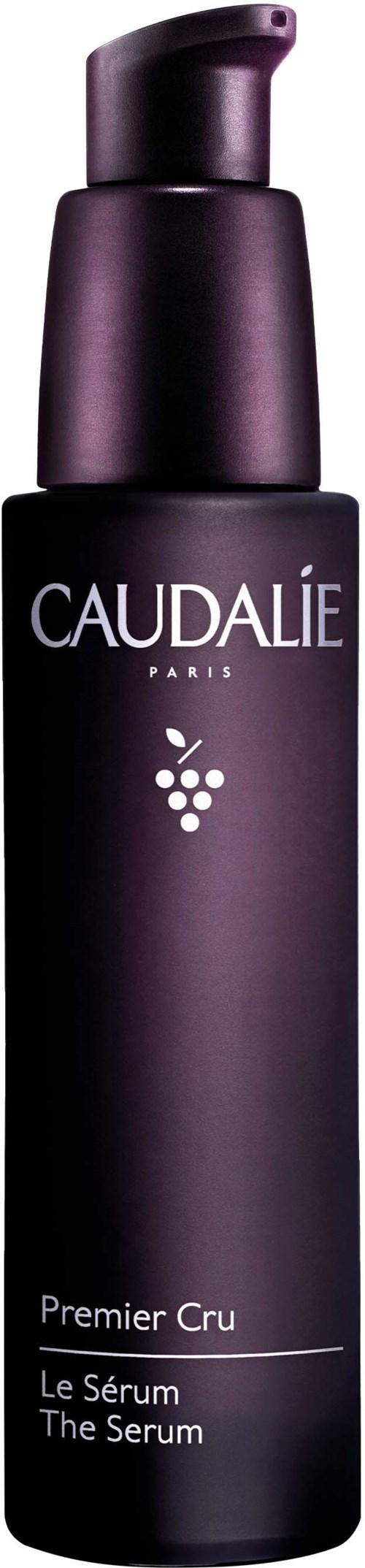 A dark purple bottle with a pump, labeled 'Caudalie' and 'Premier Cru The Serum'.