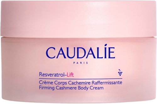 Caudalie Body Cream jar in pink with blue and purple text and logo.