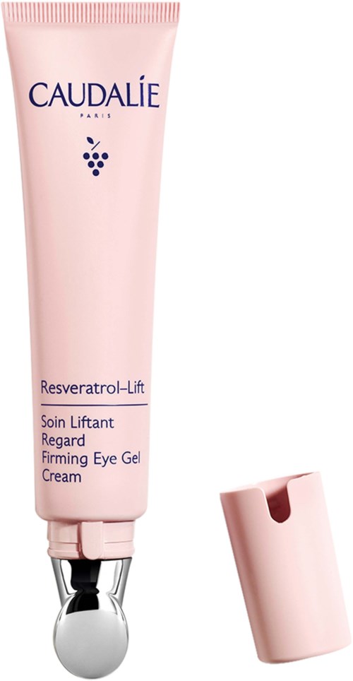 Een roze buis met ooggel, met een zilveren bolle applicator en een roze dop ernaast.
