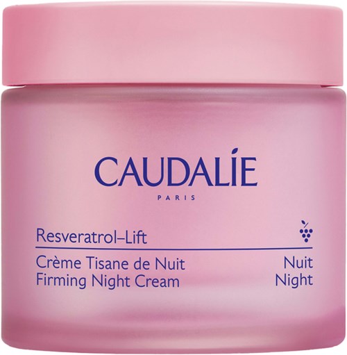 Vaaleanpunainen Caudalie-yökreemipurkki, jonka kyljessä lukee Resveratrol-Lift, pinnalla.