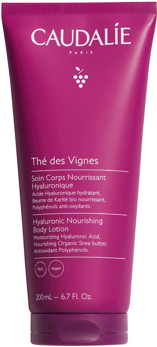 Pink tube containing hyaluronic nourishing body lotion from Caudalie, enriched with organic shea butter and antioxidants.