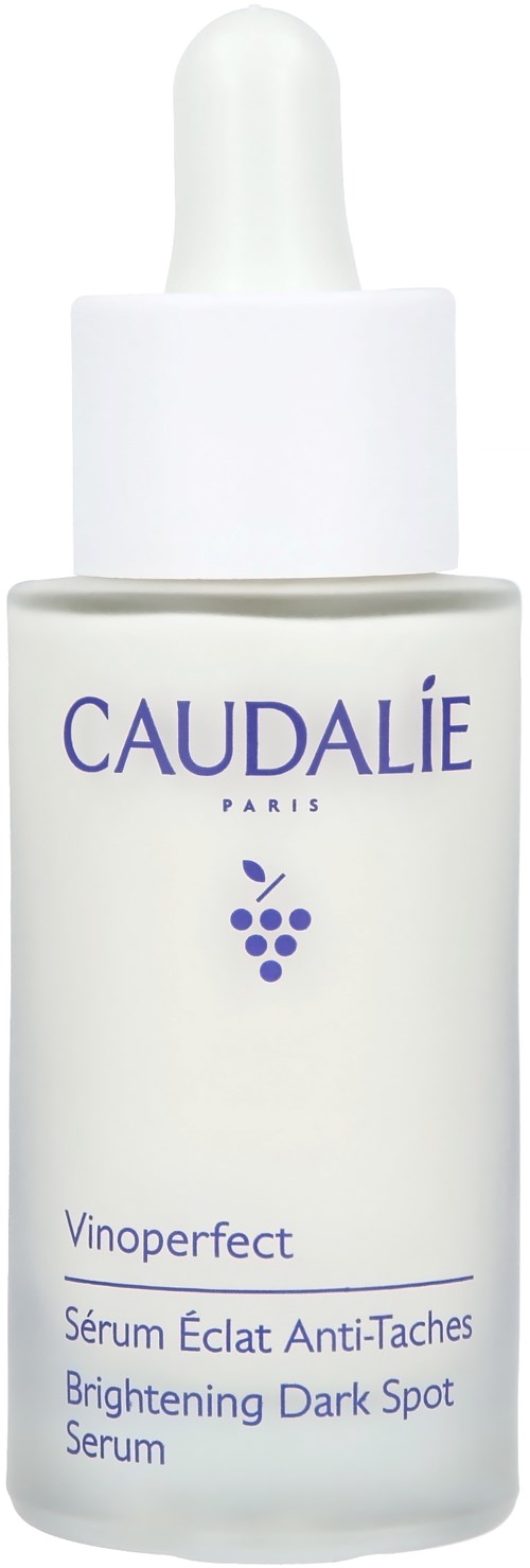 A white bottle with dropper, labeled Caudalie Vinoperfect Brightening Dark Spot Serum, used for skin brightening and dark spot treatment.