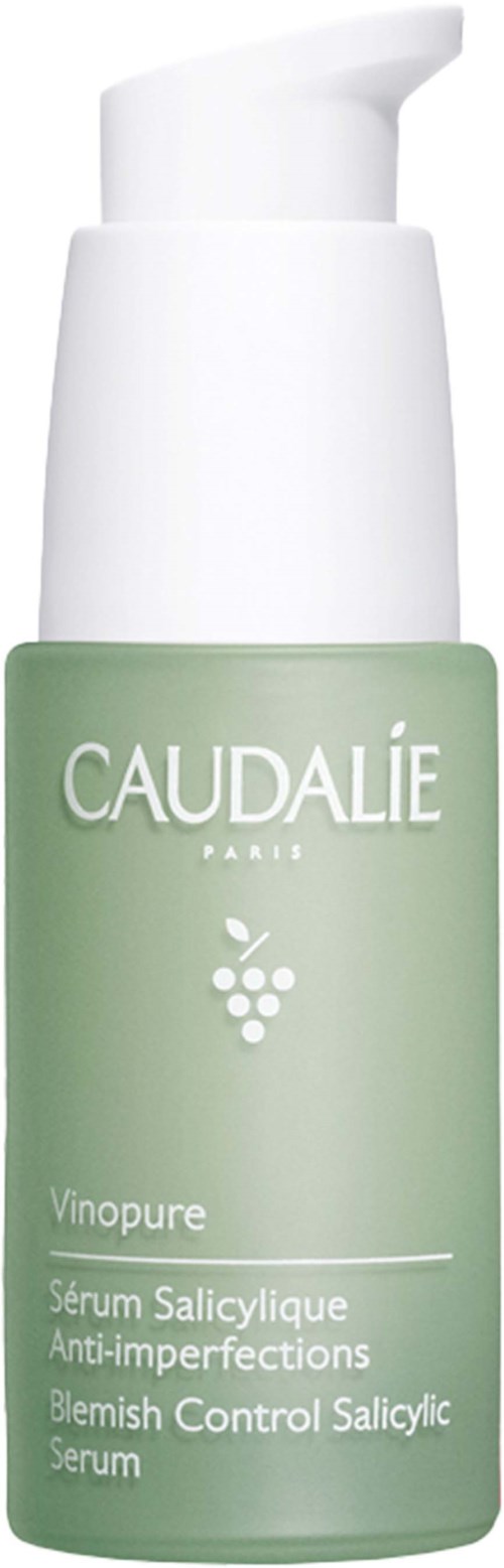 Green serum bottle with white pump labeled Caudalie Vinopure, designed for blemish control. Clear and simple design.