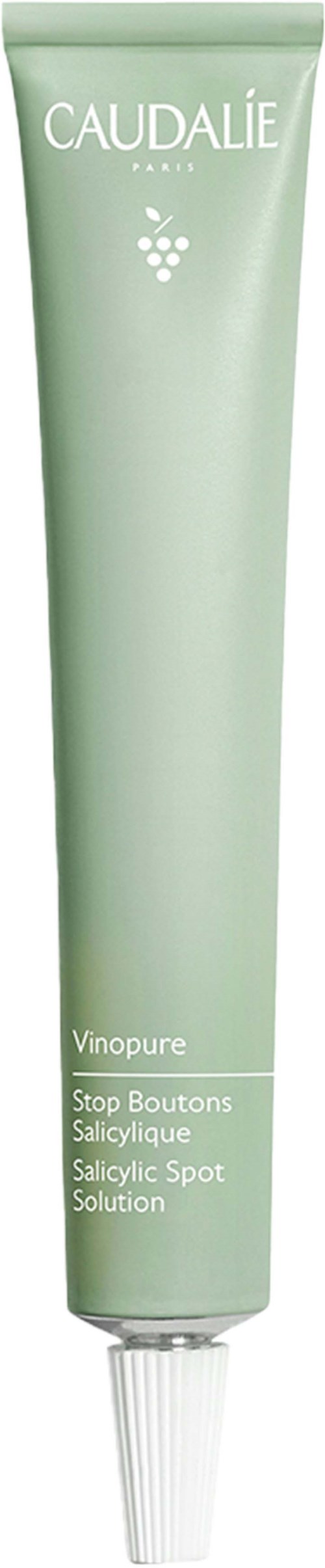 A light green tube labeled Caudalie Vinopure with a white cap, used for skincare treatment.