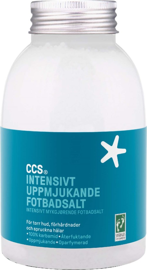 Vit flaska med blå etikett, en stjärnsymbol och svensk text om behandling av fotvårtor.