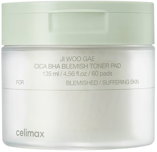 Ein weißer Behälter mit grünem Deckel, gekennzeichnet als Blemish Healing Toner Pad für die Hautpflege.