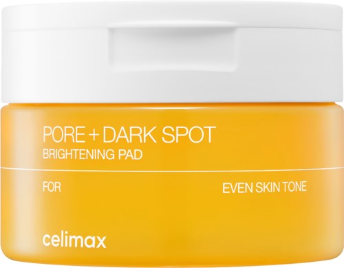Gelber Behälter mit weißem Deckel, beschriftet Pore + Dark Spot Brightening Pad für einen ebenen Hautton.