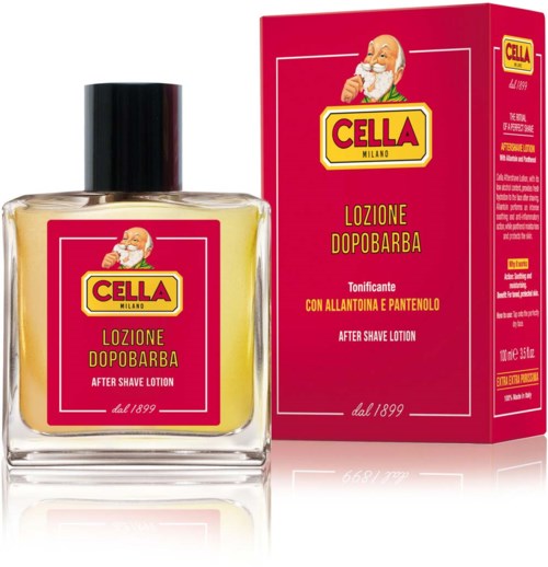 A bottle of after shave lotion with a pink box, featuring an old man with a beard and yellow, red, and white text.