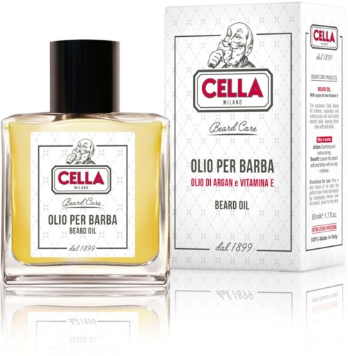 A bottle of beard oil with a label and a box behind it, both branded 'Cella Milano' with a logo.