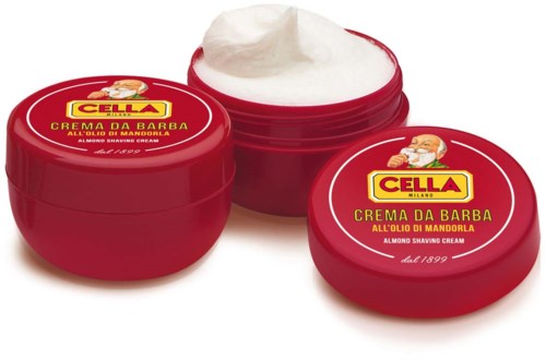 Red jar of shaving cream with a white content, labeled 'Cella' and 'crema da barba', Italian brand since 1899.