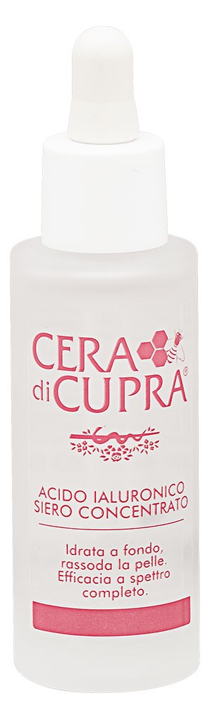 En vit flaska med dropperlock, märkt "CERA di CUPRA" och nämner hyaluronsyra för hudens fukt.