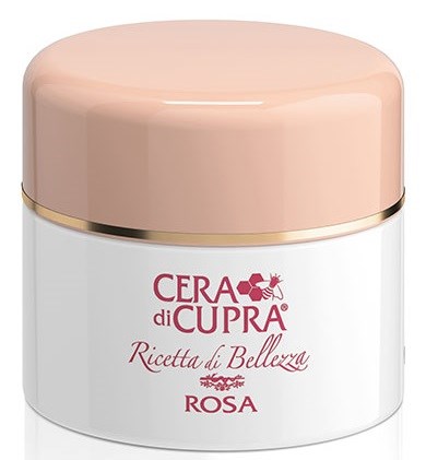 Ett vitt burk med rosa lock, märkt 'Cera di Cupra Rosa,' sannolikt en skönhets- eller hudvårdsprodukt.