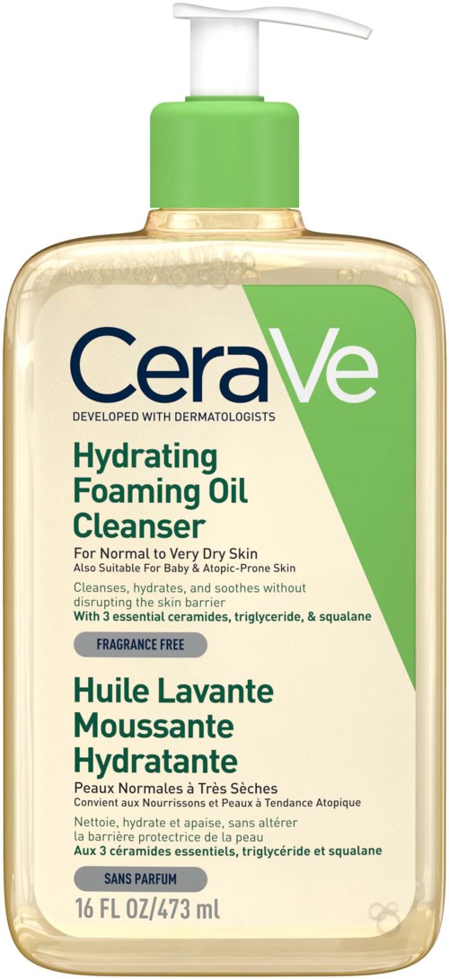A transparent bottle of CeraVe Hydrating Foaming Oil Cleanser with a pump, green cap, and label describing its use for dry skin.