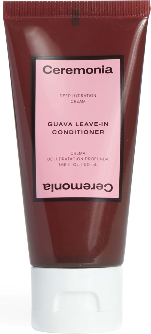 Punainen putki, jossa lukee Ceremonia syväkosteusrasva ja guava leave-in hoitoaine.