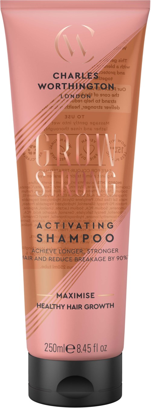 Een roze en bruine fles Charles Worthington Grow and Strength activatie shampoo voor gezonde haargroei.
