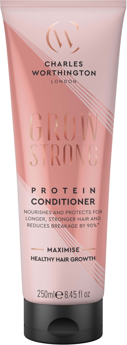 Roze haarconditioner met zwarte dop, gelabeld Charles Worthington London Grow Strong Protein Conditioner.
