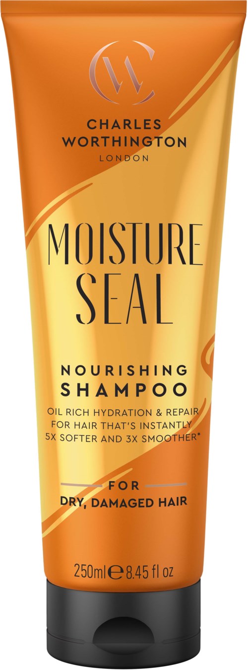 Oranje en zwarte shampoo tube voor voedend droog, beschadigd haar met vochtbonddeling. Het biedt hydratatie en reparatie.