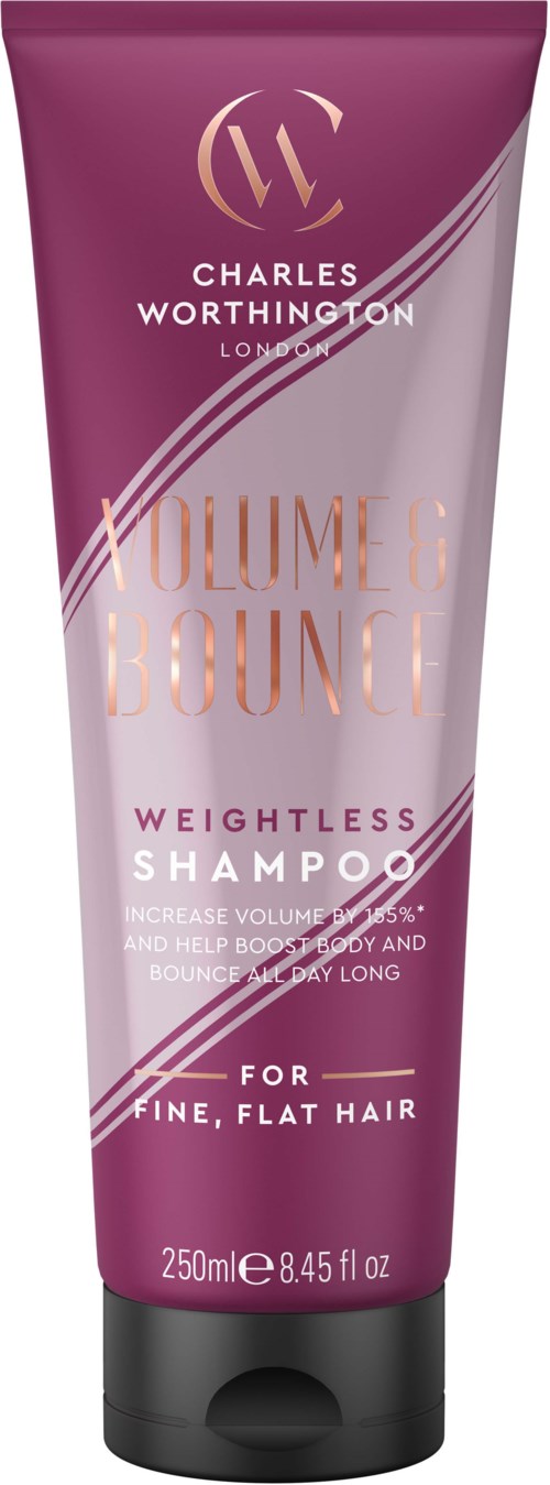 En flaska Charles Worthington Volume Bounce viktlös schampo för fint, platt hår. Den är rosa och lila med produktinformation.