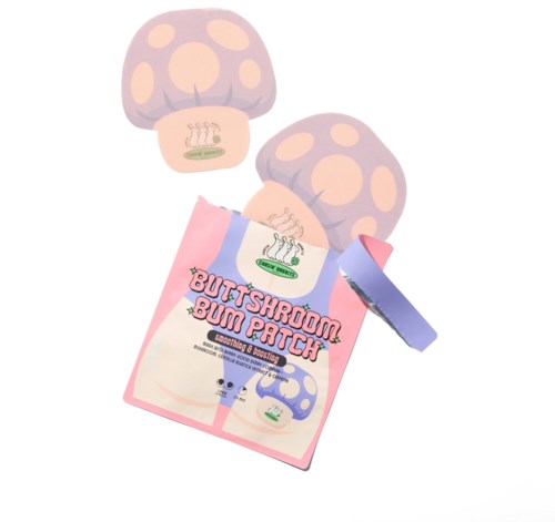 A playful package labeled 'ButtShroom Bum Patch' with illustrations of mushrooms and a comic style design.