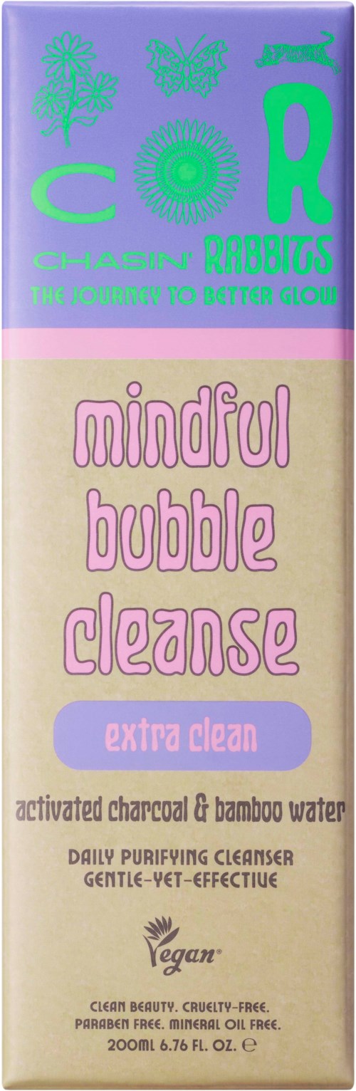 A purple and beige package with green and pink text, promoting a cleanser with charcoal and bamboo water ingredients.