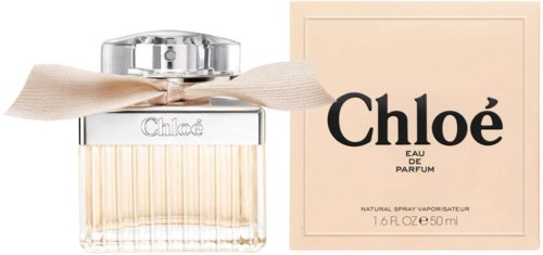 Chloé-hajuvesipullo beige-laatikon kanssa, jossa mustaa tekstiä ja nauha kaulassa.