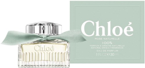 Ein Parfümflasche mit mintgrüner Schleife und einer Box mit der Aufschrift 'Chloé Rose Naturelle' für 100% natürliche Parfüm.