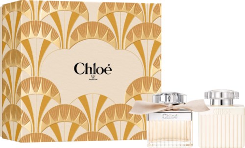 Chloe perfume box with gold geometric pattern and two perfume bottles with silver caps.