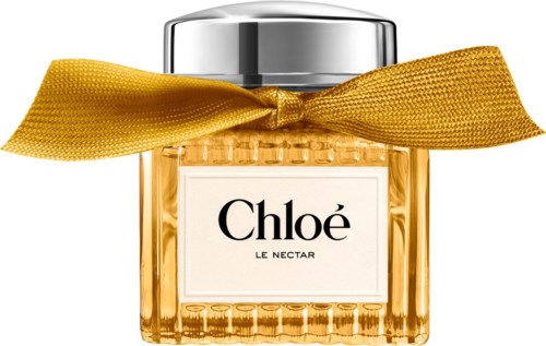 Chloé Le Nectar parfymflaska med silverlock och en gul rosett runt halsen.