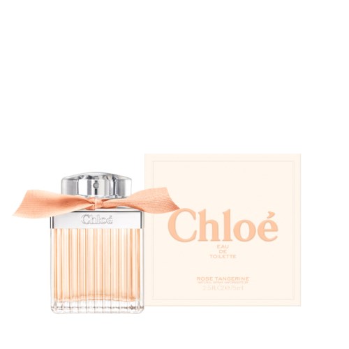 A perfume bottle with a pink ribbon and a box labeled Chloé, Rose Tangerine. Elegant and soft colors.