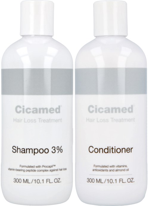 Zwei weiße Flaschen für Haarausfallbehandlung, Shampoo und Conditioner, jeweils 300 ml.