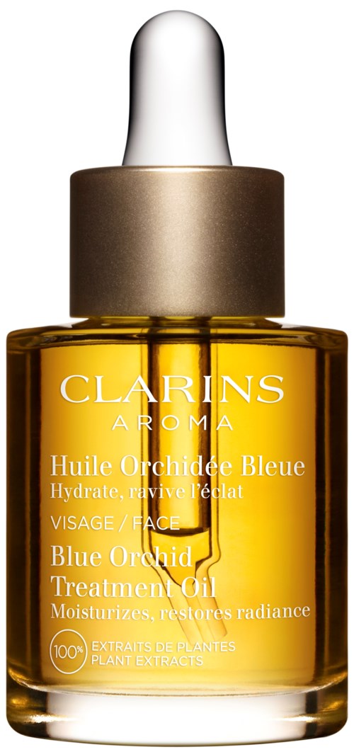 Kleine Glasflasche mit gelber Flüssigkeit, silberner Kappe und weißer Pipette, beschriftet Clarins Aroma Blue Orchid Treatment Oil.