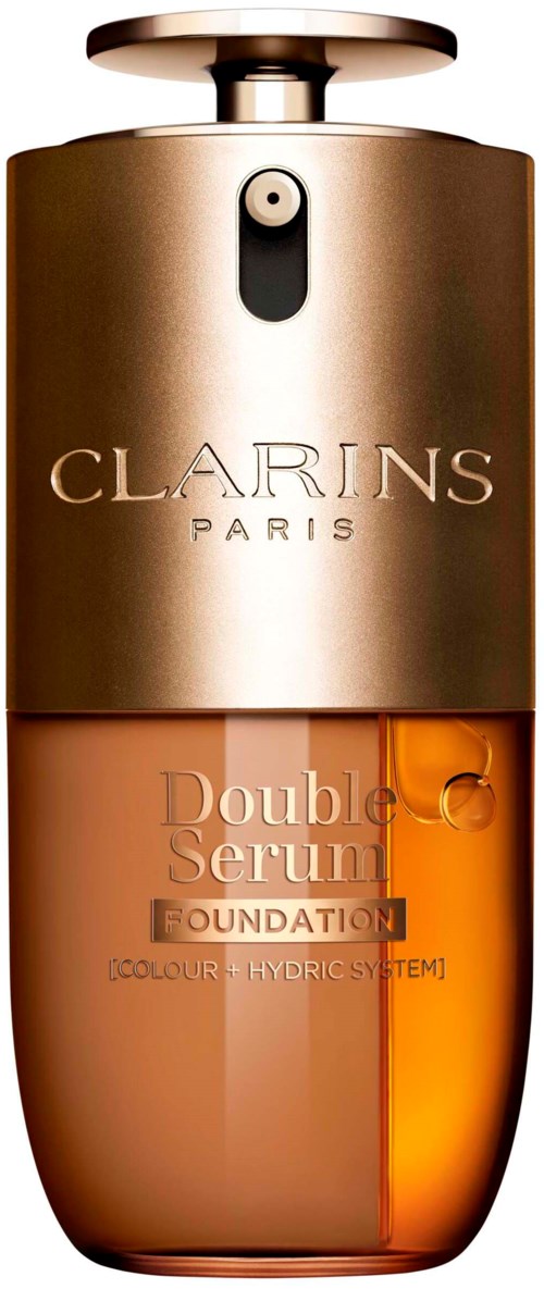 En liten flaske med gullokk, oransje bunn og teksten 'Clarins Paris' og 'Double serum' på.
