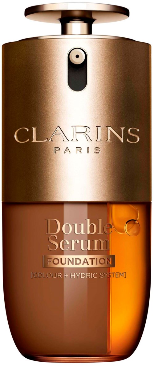Clarins foundationflaske med sprayhette, etikett med Double Serum, farge og Hydric System. Gull og brunt.