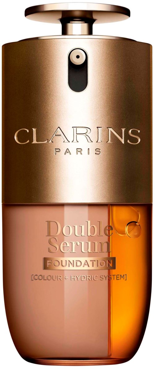 Gullfarget og ravfarget flaske med Clarins-logo, inneholder double serum foundation, fuktighetsgivende formel.