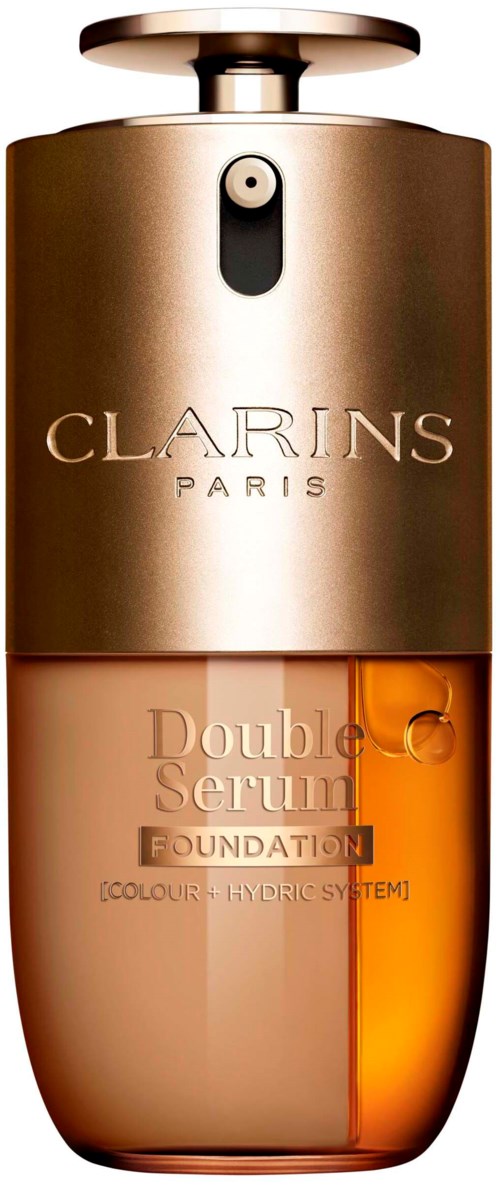 En gullfarget og ravfarget flaske av Clarins Paris Double Serum Foundation med sprayhode på toppen.