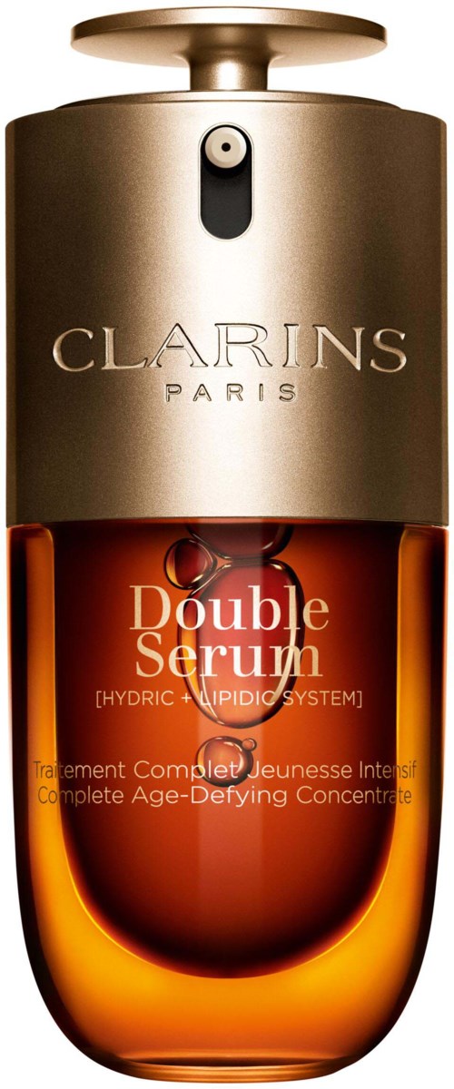 Die Flasche ist orange mit einem silbernen Deckel, gekennzeichnet Clarins Paris Double Serum, ein Hautpflegeprodukt gegen Alterung.
