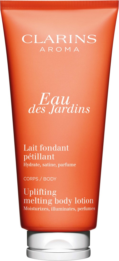 Een koraalkleurige tube van Clarins Aroma Eau des Jardins oppepende bodylotion met witte dop, beschreven als hydraterend en parfumerend.