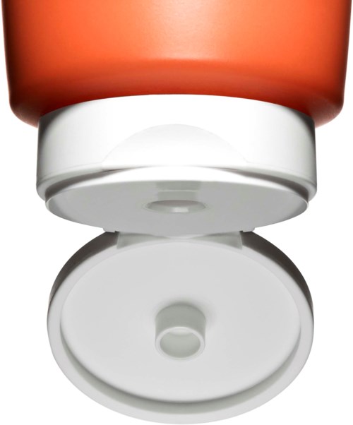 Een tandpastatube met open deksel, die het witte binnenstuk en de oranje buitenkant laat zien.