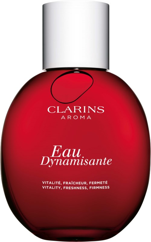 En röd parfymflaska med silverlock, märkt Clarins Eau Dynamisante, som betonar vitalitet, friskhet och fasthet.