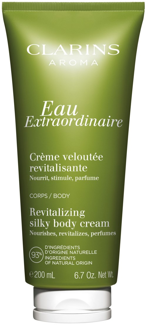 Green tube of Clarins Aroma Eau Extraordinaire body cream, with product info and ingredients listed.