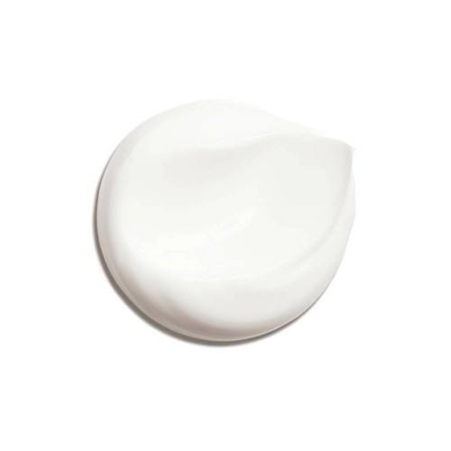 A white cream or lotion in a small container, smooth and shiny surface, round shape.