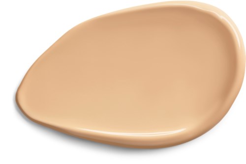 En beige flytande foundation spridd på en yta, halv oval form med slät textur.