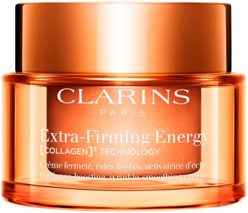 En krukke med Clarins Extra-Firming Energy krem med kobberfarga lokk og oransje beholder.