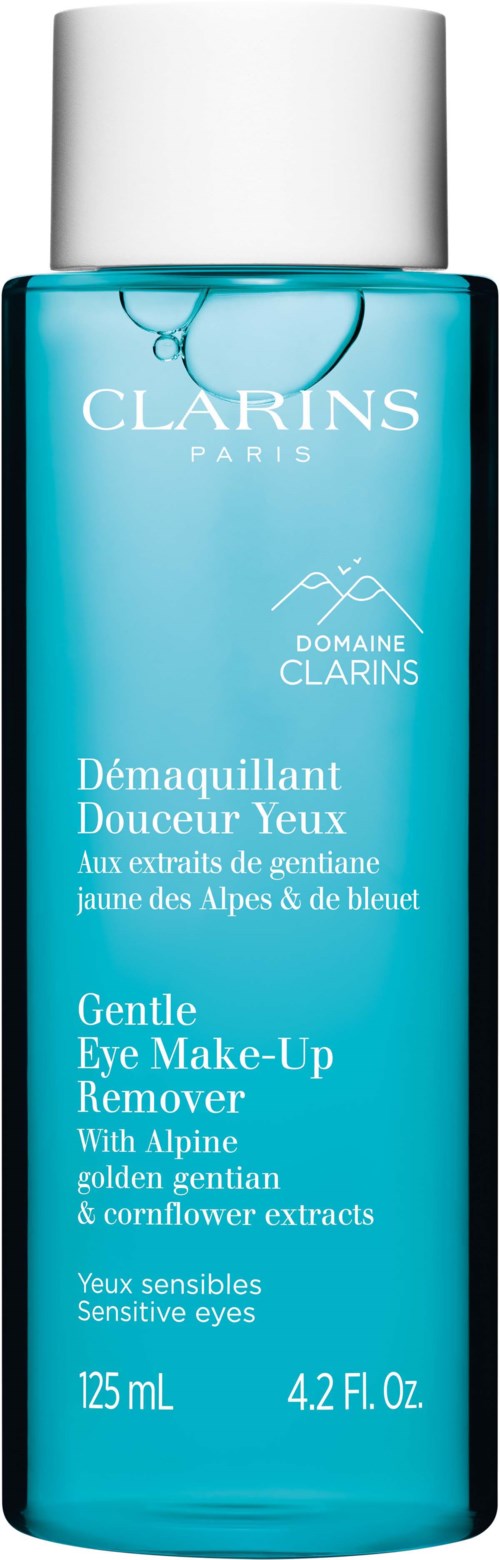 A blue bottle of Clarins gentle eye makeup remover with a silver cap, featuring text in French and English.